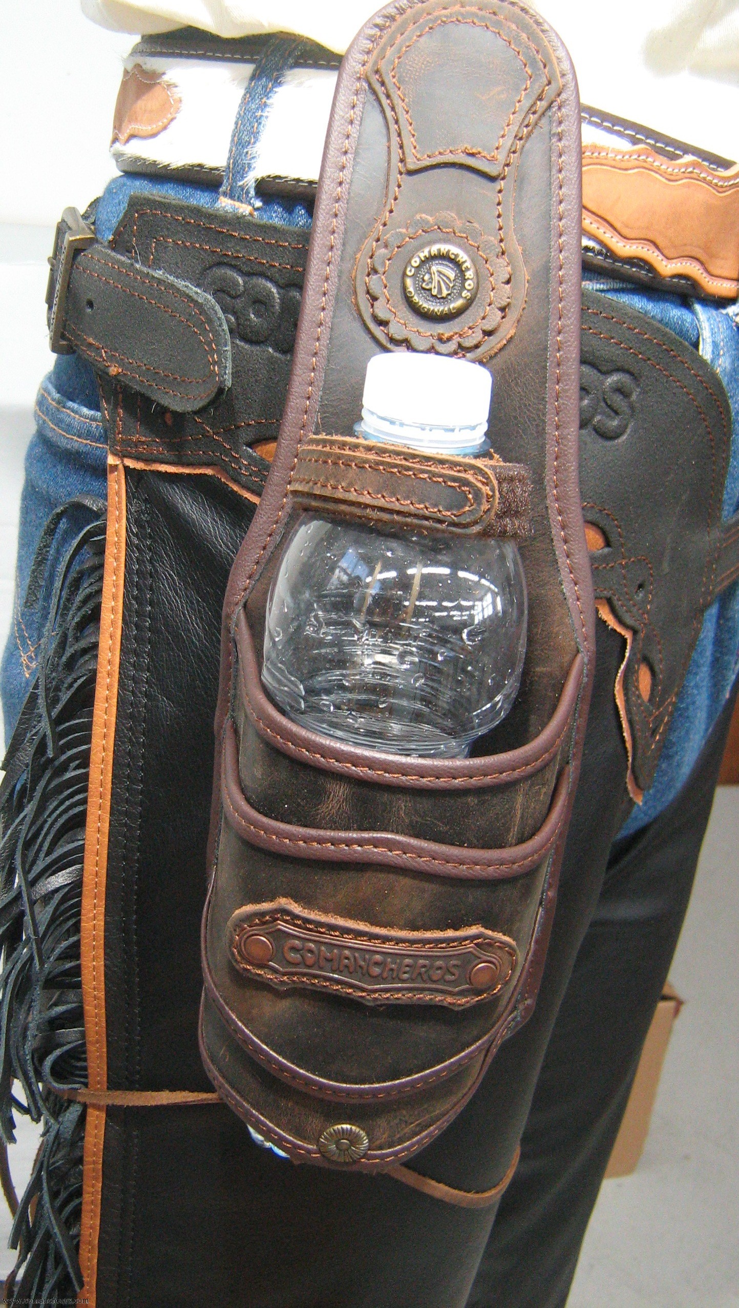 Bottle holder for saddle and belt made waterprrof leather